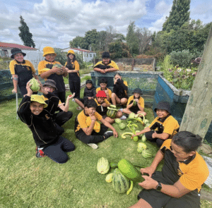 Tamariki growing and harvesting fresh kai with Garden to Table